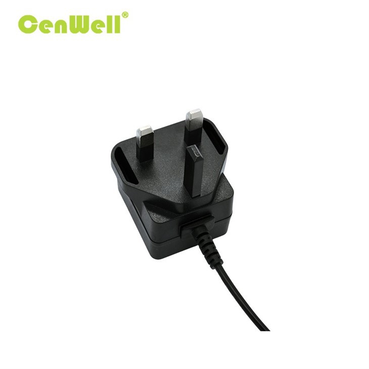 UK Plug 12W 5V 2.4A 12V 1A Wall Power Adaptor manufacturers